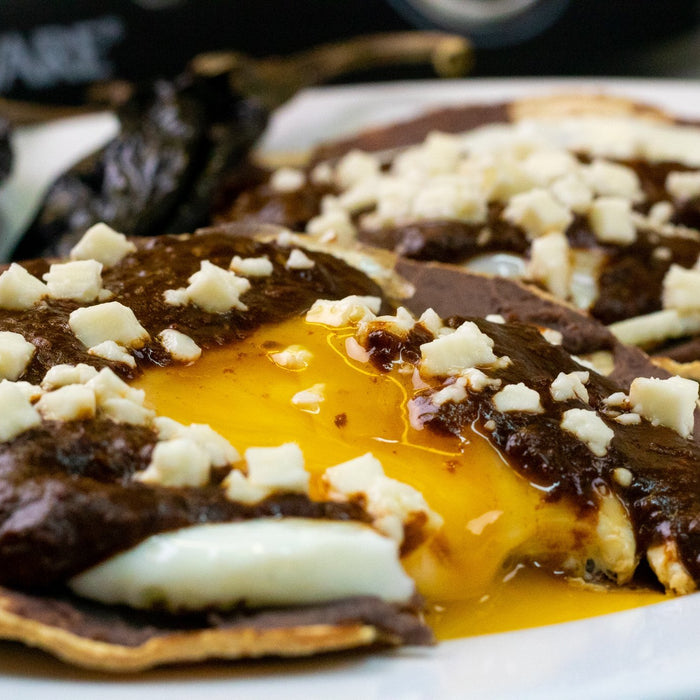 Sunny Side Up But Add A Aittle Bit Of Spice - Huevos Rancheros With Chile Pasilla Sauce | Ole Rico